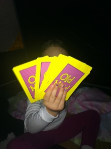 Holding all those cards is hard for little hands!