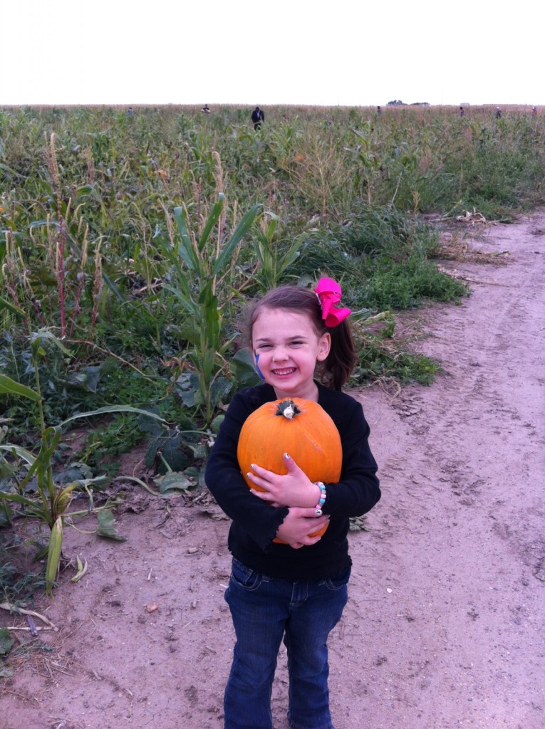 This girl could pick pumpkins all day...