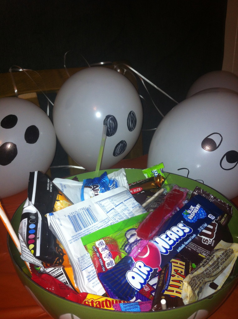 The ghosts are guarding the candy bowl...