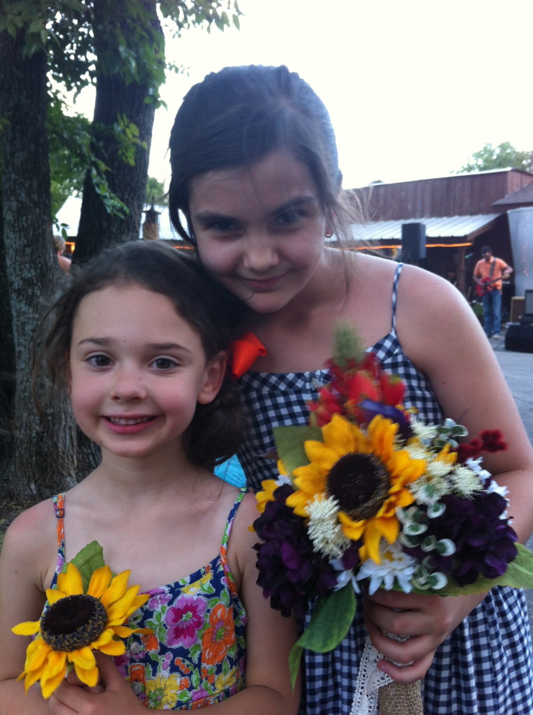 Sawyer's new friend, Katie, caught the bouquet and shared some flowers with her