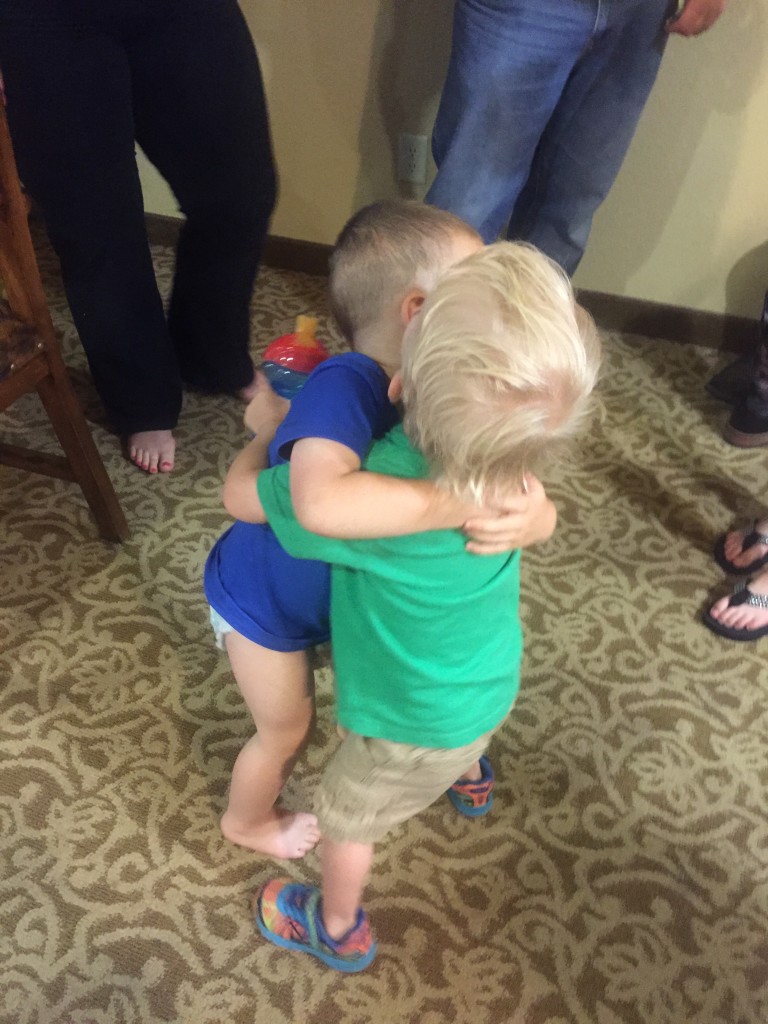 The boys hugging goodbye