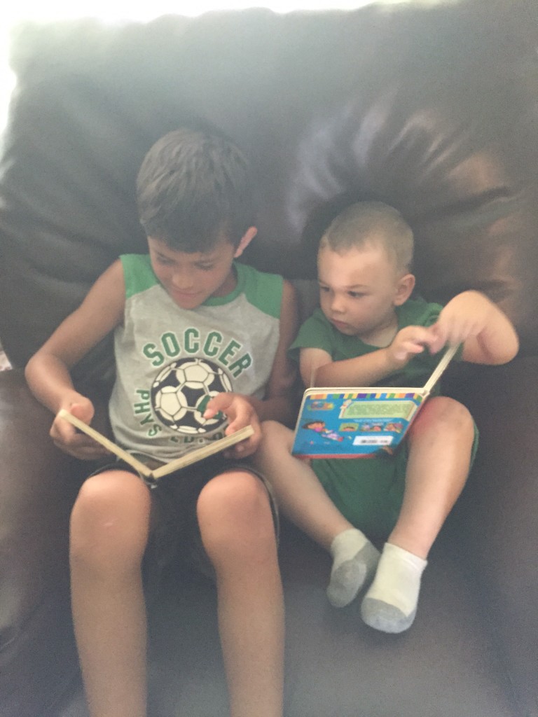 Reading with Tanner.  Wryder loved having a brother around!
